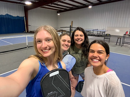 IOHRM students in a pickleball court