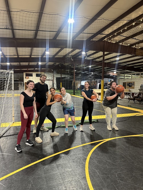 IOHRM students at a basketball court