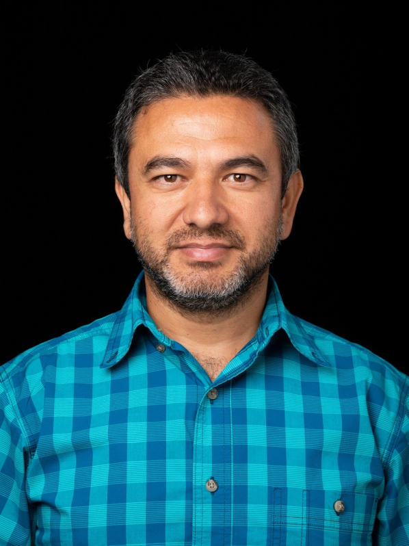 Headshot image of Dr. Yalcin Acikgoz